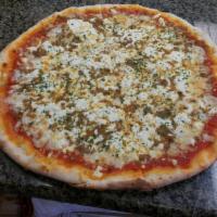 Lasagna Pizza · Fresh ground beef, sausage, ricotta and marinara sauce.