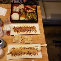 The Shrimp Pimp · Shrimp tempura, avocado and cucumber roll topped with ebi (cooked shrimp), tempura flakes, s...