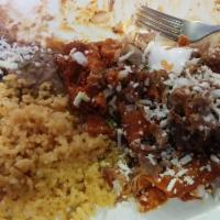 Chilaquiles · Deep fried tortilla, scrambled eggs, simmered in sauce: red, green, or ranchera. Topped with...