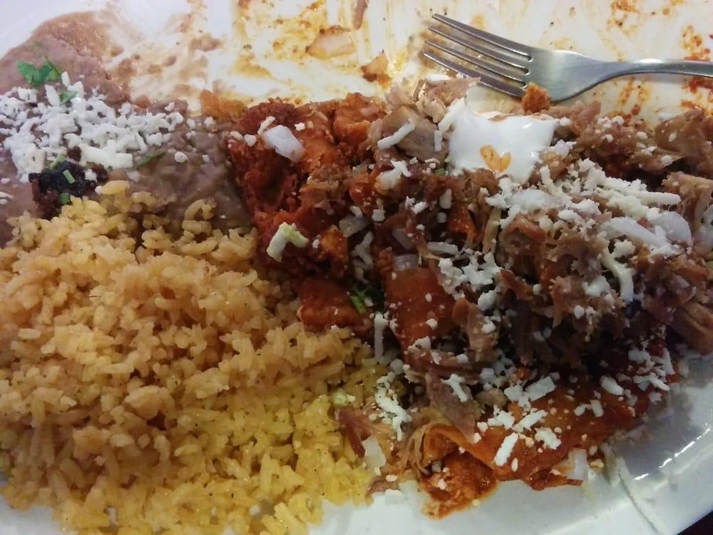 Chilaquiles · Deep fried tortilla, scrambled eggs, simmered in sauce: red, green, or ranchera. Topped with onions, sour cream and cheese.