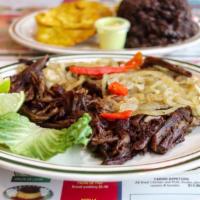 Vaca Frita · Grilled shredded beef.