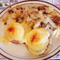 Eggs Benedict · Poached eggs, Canadian bacon, hollandaise and English muffin.