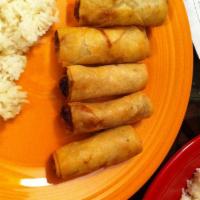 Spring Rolls · 5 deep fried spring rolls stuffed with bean thread noodles, shiitake mushrooms, celery, and ...