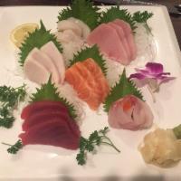 Sashimi · Assorted fillets of raw fish.