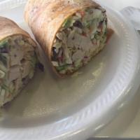 Southwest Chicken Wrap · Chipotle tortilla, chicken, cabbage, romaine lettuce, shredded cheese, and chipotle ranch sa...