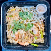 Pad Thai · Eggs, red and green onion and bean sprouts with crushed peanuts.