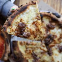 Honey Boo Boo Pizza · Caramelized onions, roasted garlic, Parmesan, fresh mozzarella, taleggio DOP, rosemary, sea ...