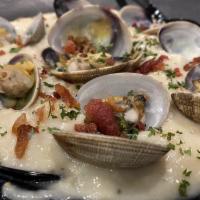 Clam Chowder Bowl with Live Manila Clams and Crackers · 