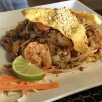 Pad Thai · Rice noodles, stir-fried with eggs, bean sprouts, onions and peanuts.