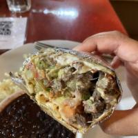 California Burrito · Flour tortilla, queso Oaxaca, fries, arrachera skirt steak, guacamole, pico and crema.