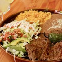 Carne Asada · Tender shirt steak charbroiled served with rice, beans, fried jalapeno, pico de gallo, avoca...