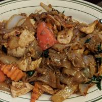 Drunken Noodles · Your choice of beef, chicken, or pork with fresh broad noodles, sauteed with garlic, bamboo ...