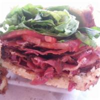 Italian BLT Sandwich · Served with crispy pancetta, arugula, tomatoes, and basil aioli on brioche.