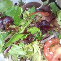 Pear and Gorgonzola Salad · Mixed greens, fresh pear, Gorgonzola, candied walnuts with balsamic vinaigrette.