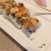 Rock Shrimp · White fish in olive oil, scallions and lemon-soy sauce.