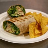 Chicken Caesar Wrap · Grilled chicken, cucumbers, romaine, turkey bacon, Parmesan cheese and Caesar dressing in a ...