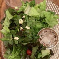 Chopped Salad · Gluten-free. Chopped greens with cherry tomatoes, fresh mozzarella, smoked bacon, cucumbers,...