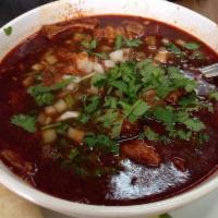 Menudo · Tripe stew. Traditional soup from Mexico. Made with tripe, stomach and cow feet, vegetables ...