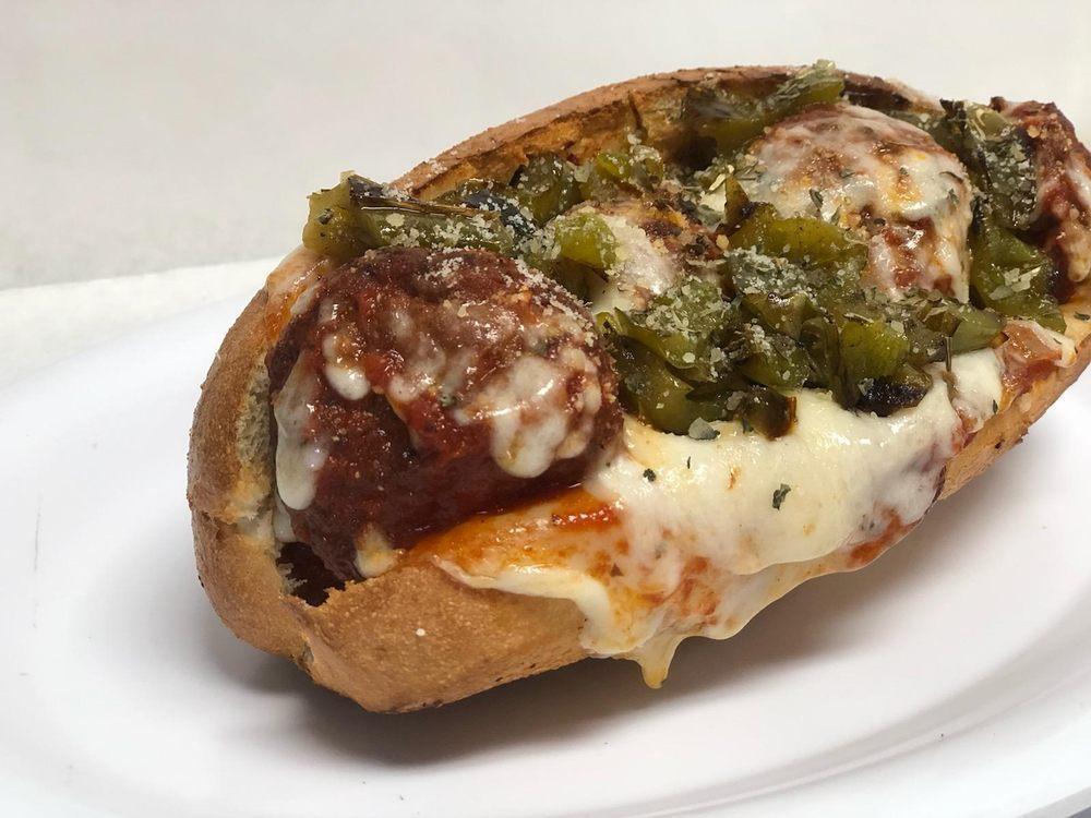 Meatball Sub · Meatballs, mozzarella, provolone, house made marinara, and sweet grilled green peppers.