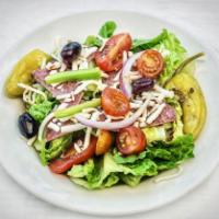 Antipasto Salad · Italian salami, pepperoncini, whole Kalamata olives, mozzarella added to garden salad.
