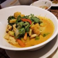 Yellow Curry · Very mild. Mix veggies, potato, carrot and Thai basil in a very mild yellow curry sauce with...