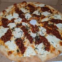 Lasagna Pizza · Fresh ground beef, fresh garlic, mozzarella, Parmesan and ricotta cheese with homemade marin...