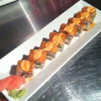 South Beach Roll · Imitation krab, cream cheese, avocado, and shrimp tempura on top with chili mayo and eel sau...