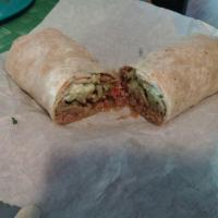 Carne Asada Burrito · Includes guacamole and pico de gallo.