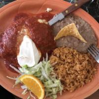 Chile Relleno · 1 stuffed pepper filled with cheese or beef. Topped with tomato sauce and sour cream. Choice...