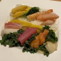 Chirashi · Raw item. 14 pieces of raw fish over seasoned rice.