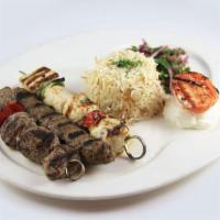 Mixed Grill · Chicken, lamb and kafta kebabs, garlic whip and rice.