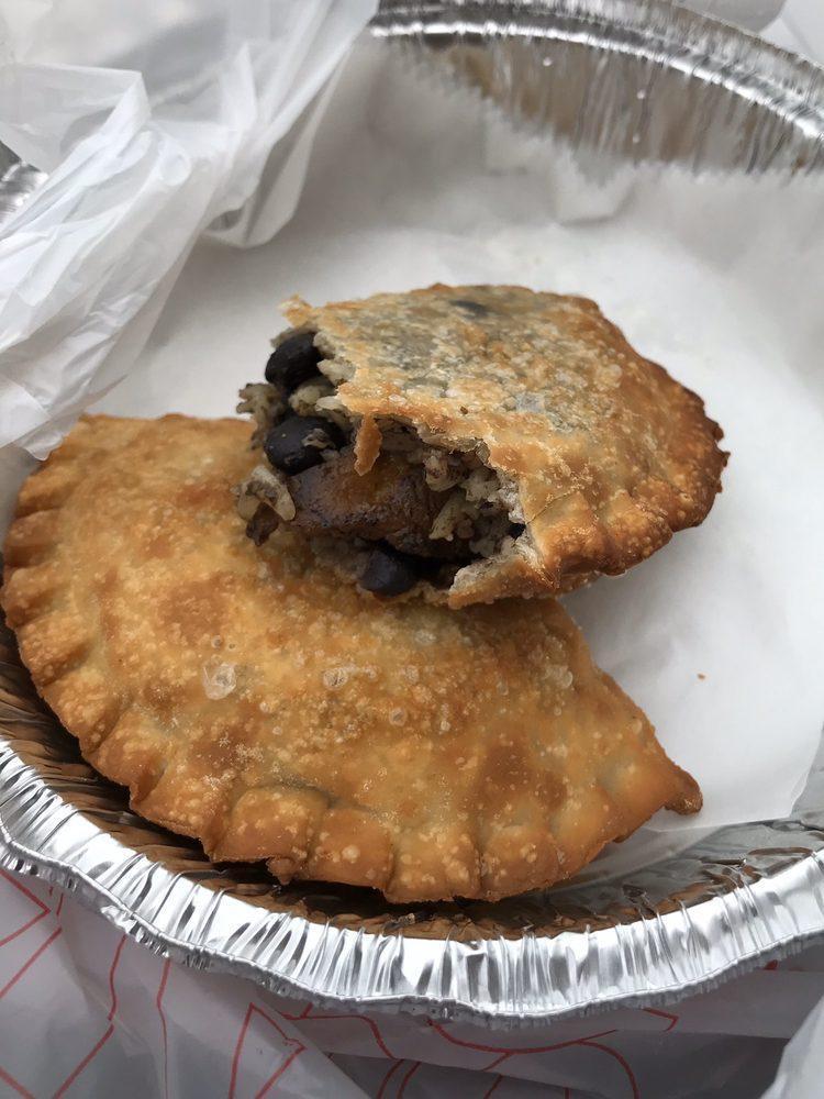Typical Cubano Empanada · White rice, black beans and sweet plantains.