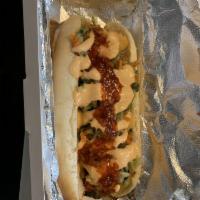 Vietdog · Cucumber, carrot, jalapeno and cilantro slaw, garlic chili sauce and Sriracha mayo. (Substit...