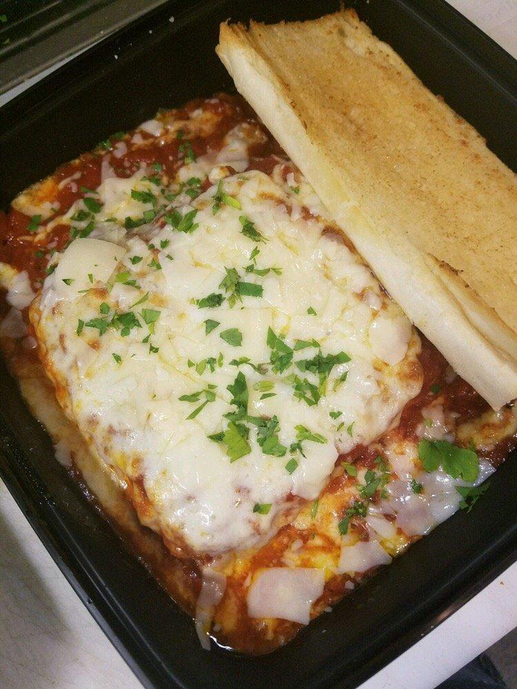Lasagna · Homemade from the family recipe: layers of ribbon noodles and 3 cheeses, smothered in marinara sauce, topped with baked mozzarella cheese and fresh parsley.