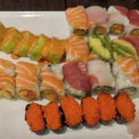 Rainbow Roll · Crabmeat, cucumber, and avocado top tuna, salmon, and yellowtail.