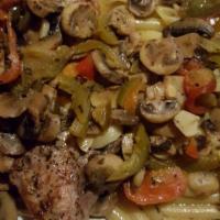 Pork Chop Scarpariello · Served with hot and sweet vinegar peppers, mushrooms, garlic, white wine, butter and anchovy...