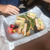 California Club Sandwich · Turkey, avocado, bacon, cheddar, Swiss, tomato, cucumber, organic greens and balsamic basil ...