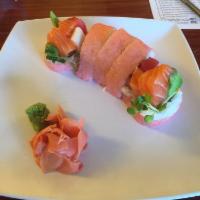 Pink Lady Roll · Tuna, yellowtail, salmon, and avocado in pink soy paper.