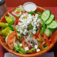 Greek Salad · Romaine lettuce, onion, black olives, tomatoes, pepperoncinis, feta cheese, cucumbers and be...