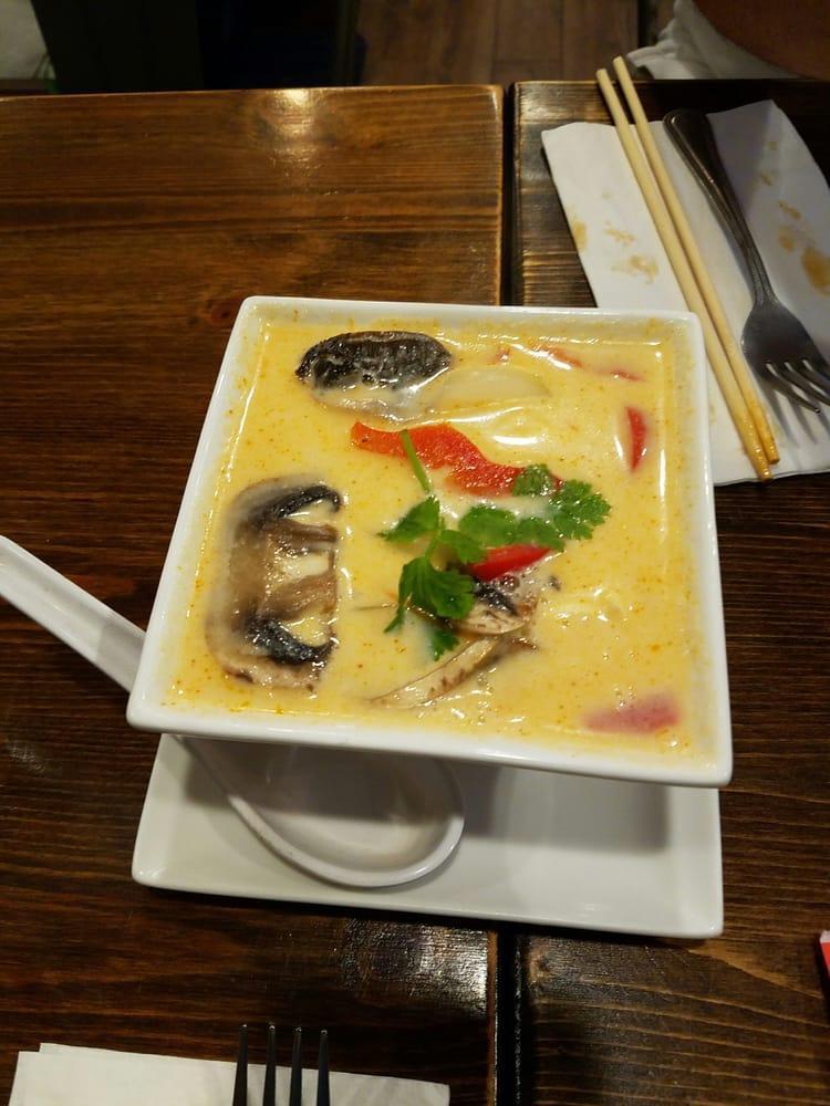 Tom Kha Soup · Classic Thai soup with coconut milk, chicken, mushroom, bell pepper and cilantro.