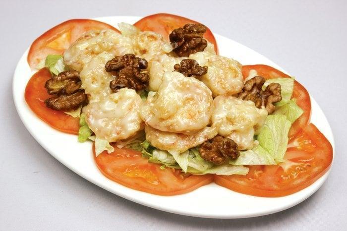Honey Walnut Shrimp · Shrimp lightly fried, and then lightly smothered with a tart and sweet mayonnaise. Garnish with our home made honey glaze walnuts.