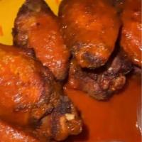 Mexican Hot Wings · Our Mexican style jumbo chicken wings tossed in a special hot sauce and served with ranch an...