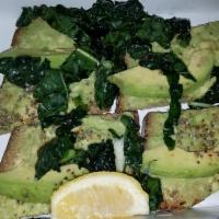 Avocado Toast · Avocado mash, citrus cumin salt, chia seeds with marinated kale. (vegan)
