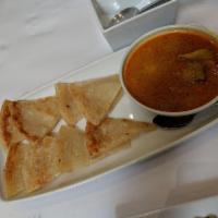 Palata · Multi-layer bread served with coconut chicken. Vegetarian curry or lamb curry available for ...