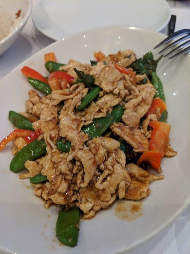 Rangoon Lemongrass Chicken · Wok tossed with chili, garlic, soy sauce, fish sauce, snap peas, red bell peppers and lemongrass; finished with fresh basil. Spicy.
