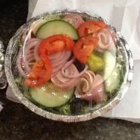 Italian Salad · Lettuce, tomatoes, onions, cucumbers, black olives, pepperocini peppers with ham, salami and...