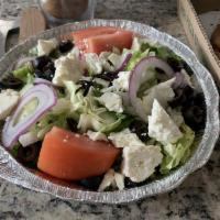 Greek Salad · Lettuce, tomatoes, onions, green peppers, black olives, pepperocini peppers, cucumbers and c...