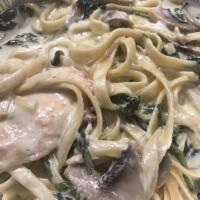 Chicken Florentine · Boneless chicken breast with spinach and sauteed mushrooms in a white cream sauce tossed wit...