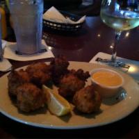 Conch Fritters · Chopped conch meat in seasoned batter and fried until crisp