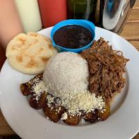Pabellon Criollo · Venezuelan national dish. Shredded beef, white rice, black beans, and fried sweet plantains ...